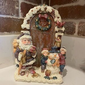 Festive Santa and Snowman Holiday Figurine